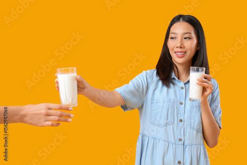 Young Asian woman giving gl...