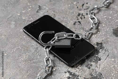 Open padlock with chain and...