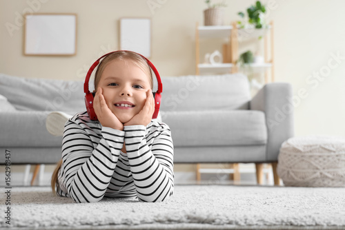 Little girl with headphones...