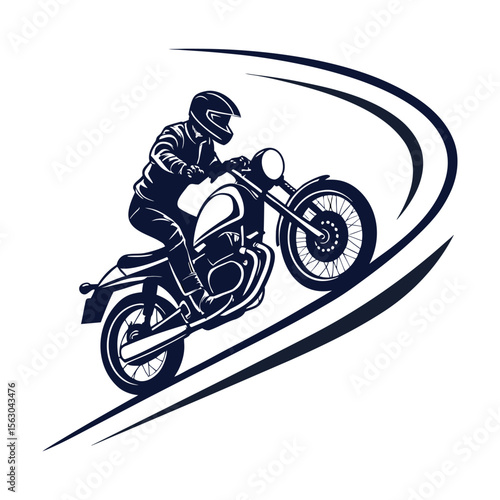 A motor bike rider riding fast in a cornering way