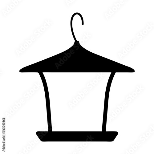 Black silhouette of a hanging bird feeder with a hook and roof