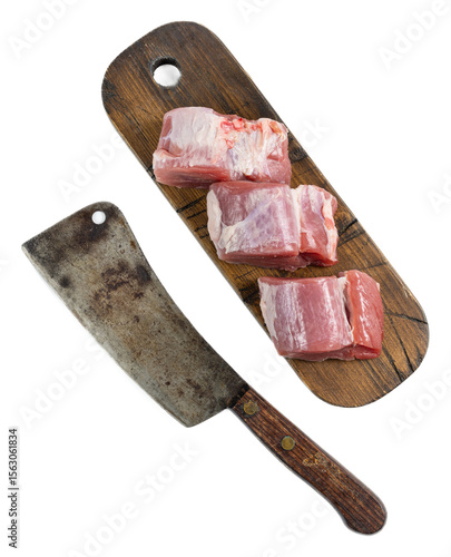 Fresh raw pork tenderloin medallions on wooden cutting board with butcher knife isolated on transparent background