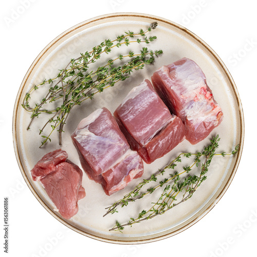 Fresh raw pork tenderloin medallions with herbs on a rustic ceramic plate, isolated transparent background, appealing, premium quality, tender, juicy, natural, culinary, meat, protein, healthy, organ