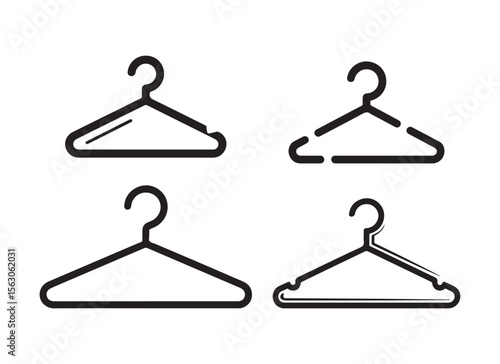 Four different styles of black clothing hangers isolated on white background
