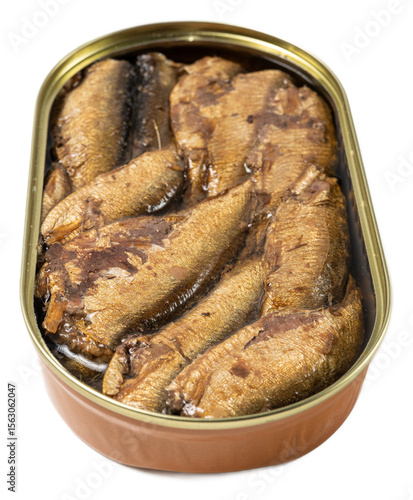 Open tin can of preserved smoked sardines sprats in oil with flaky fish fillets, textured surface, glossy appearance, and vibrant realistic colors on a black background