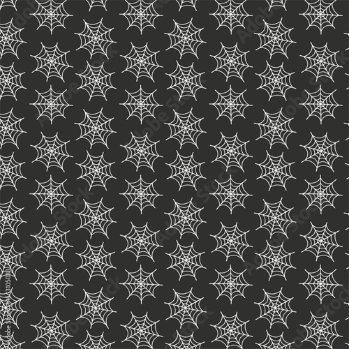 A seamless pattern composed of white spiderweb outlines against a dark gray or black background. The spiderwebs are arranged in a repeating grid-like formation.