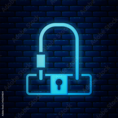 Glowing neon Bicycle lock U shaped industrial icon isolated on brick wall background. Vector