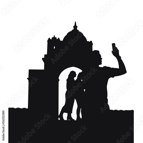 Couple taking selfies by monument silhouette, modern romance