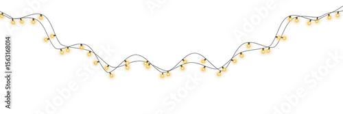 Fotografie Christmas garland lights glow in cozy golden tones