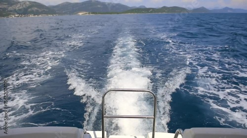 Adriatic boat trip video with coastal landscapes, green hills, blue sea, white waves and scenic views through window, Croatia summer maritime journey
