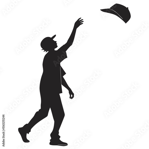 Silhouette person tossing cap skyward throwing