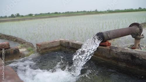 Wallpaper Mural water flow from pipe at agriculture field  Torontodigital.ca