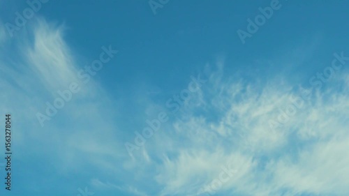 Sunny Blue Sky and White Clouds Time Lapse, Slow Motion. White Clouds and Pure Azure Blue Skyscraper, Atmosphere, Aerial Drone View, Air Plane Window View, Firmamemt, Heaven Background.