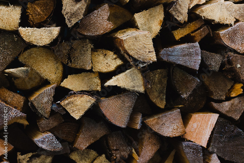 Wallpaper Mural Close-up of stacked firewood logs showing natural textures and grain patterns, creating a rustic and warm visual of cut wood ready for burning or storage in a traditional setting Torontodigital.ca