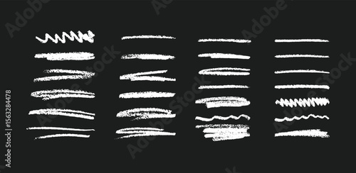 Chalklike white strokes on a black background arranged in four columns
