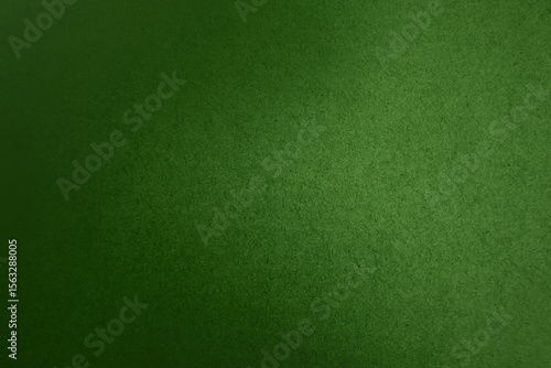 Solid green tone color paint on blank eco environmental friendly cardboard box paper texture background with space minimal simple style 