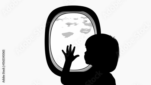 A child looking out of an airplane window towards the clouds during a flight in a black and white image silhouette