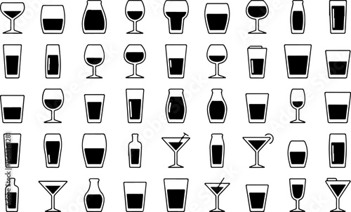 Various drinkware and bottles with dark liquid glassware drinks