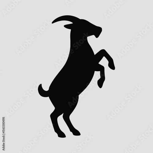 Silhouette Goat standing on hind legs black vector illustration