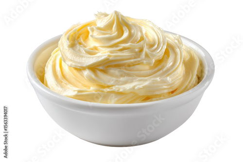 Creamy butter in a white bowl delicious swirl texture isolated on a transparent background