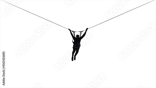 Silhouette of a person ziplining against a pale sky/A dramatic silhouette of a person suspended in mid-air, securely attached to a zipline.