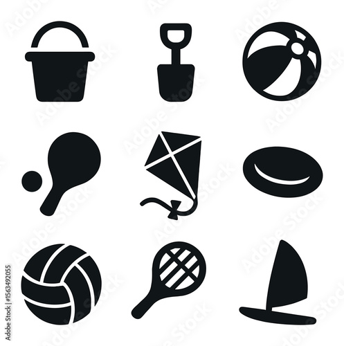 Beach Game Icons. Solid, filled icons set of beach games and fun: sand bucket, shovel, beach ball, paddleball,