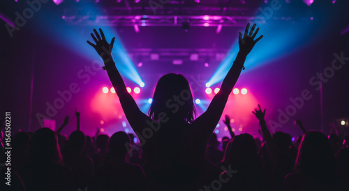 Wallpaper Mural An energetic concert scene with colorful stage lighting and cheering crowd. Torontodigital.ca