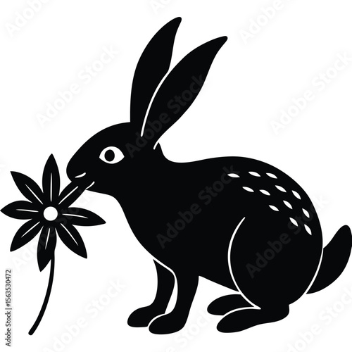 Stylized black silhouette of a rabbit nibbling on a flower