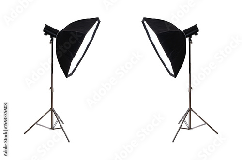 Studio flash with softbox on stainless steel tripod isolated.