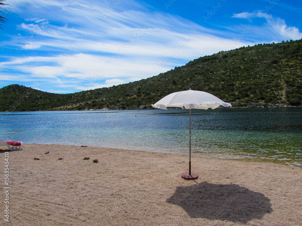 Fototapeta premium A little shade at the beach in Croatia