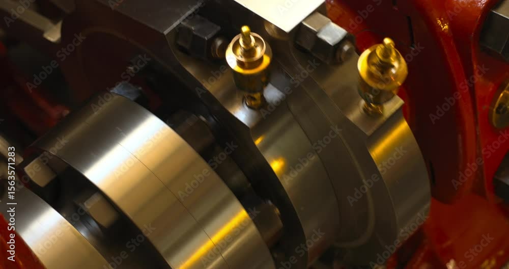 Active Steam Engine Aboard Ship with Red Machinery Active Steam Engine Aboard Ship with Red Machinery
