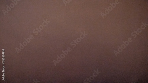 Plain dark brown textured background with a subtle gradient, offering a versatile and earthy backdrop