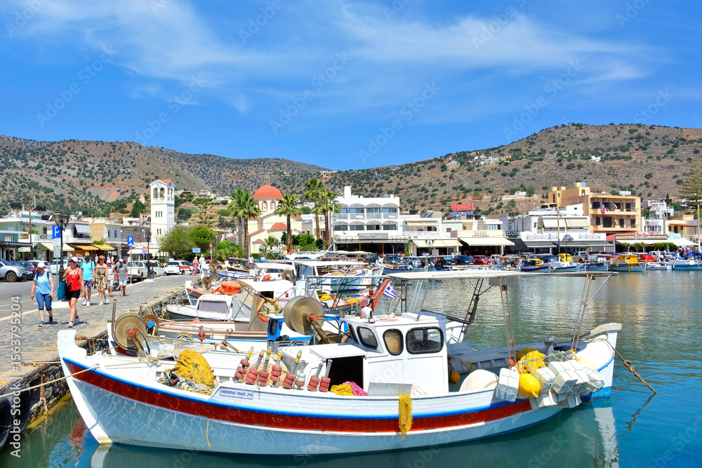 Fishing boats in marina. Elounda is a small fishing town on the northern coast of the island of Crete. Fishing boats in marina. Elounda is a small fishing town on the northern coast of the island of Crete.