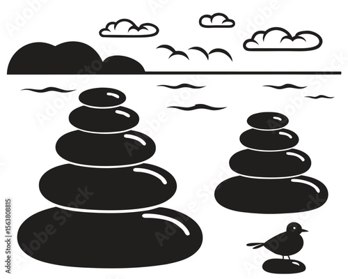 Balanced stack of black and white zen spa stones