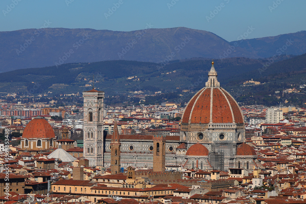 Fototapeta premium View of Florence in Central Italy with Cathedral with Dome of Brunelleschi Architect and Italian Apennines Mountains
