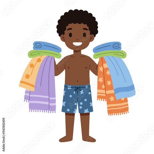 Boy with towels holding bath linens. Ideal for bathroom organization, laundry care, and household management content.