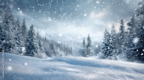 Gentle snowfall blankets a serene winter forest landscape with a foreground of sparkling snow