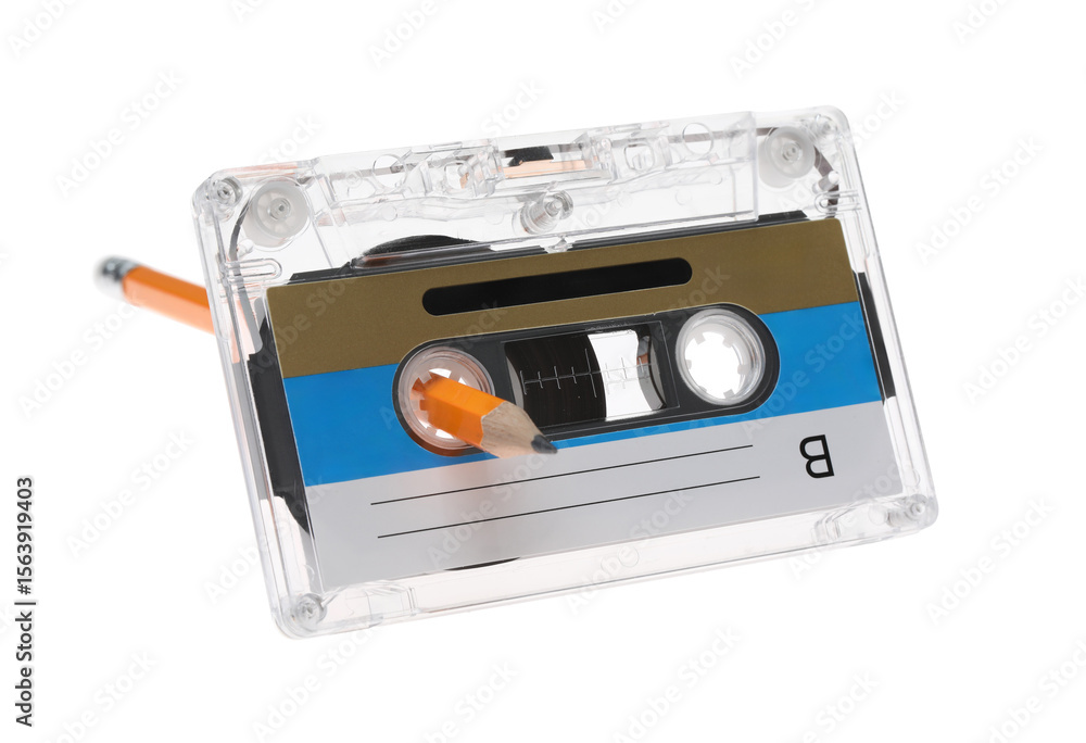 Fototapeta premium Rewinding audio cassette with pencil isolated on white