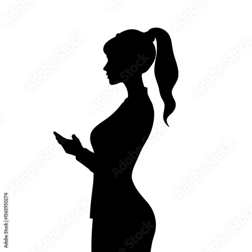 Silhouette of woman holding smartphone while standing in profile  