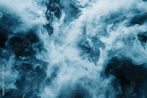 Abstract clouds of blue-tinged vapor swirl, creating an ethereal and dreamlike atmosphere, like smoke against a dark backdrop.