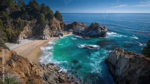 Wallpaper Mural This breathtaking coastal landscape showcases gentle waves lapping against rugged cliffs, with vibrant turquoise waters contrasting a soft sandy beach under clear blue skies Torontodigital.ca