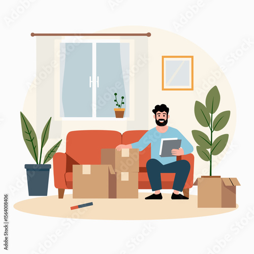 Man sitting on couch with boxes while organizing a new home  