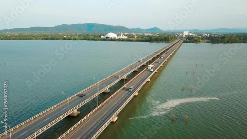 Wallpaper Mural Aerial view of a long bridge spanning the sea with cars driving across Torontodigital.ca