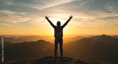 Wallpaper Mural Silhouette of Hiker Celebrating Sunset on Mountain Peak Torontodigital.ca