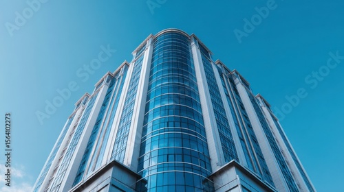 Modern highrise building blue glass facade urban architecture cityscape business corporate