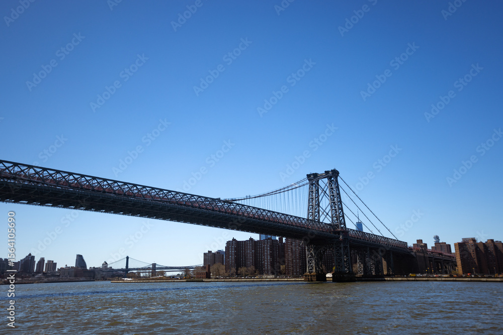 Suspension Bridge Under Clear Blue Sky Suspension Bridge Under Clear Blue Sky