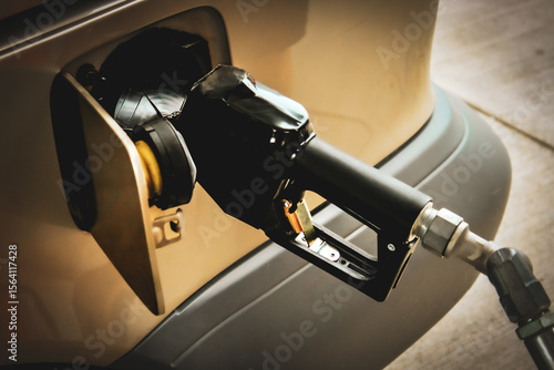 Fotografie close-up of refueling a vehicle at a gas station