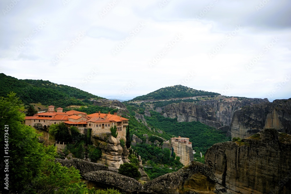 Obraz premium Great Meteoron Monastery Overlooking Roussanou Monastery in Meteora Greece