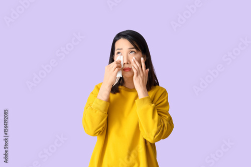 Allergic Asian woman with t...