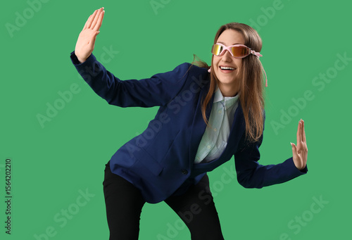 Funny young businesswoman i...
